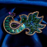 Peacock design saree pin with colorful enamel and decorative detailing