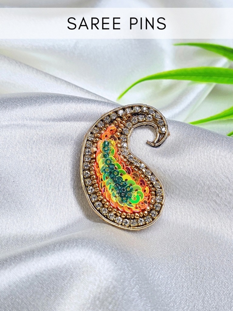 Decorative saree pins for traditional outfits