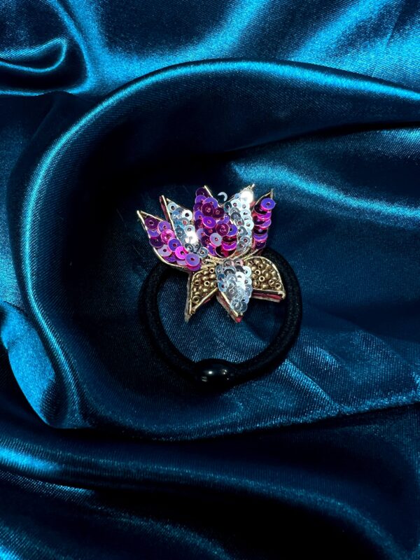 Lotus design hair tie with elegant detailing