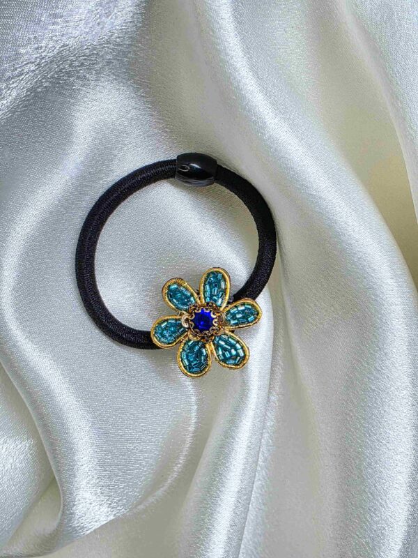 Cyan Blue Flower Hair Tie – Stylish Floral Hair Accessory Cyan blue flower hair tie for stylish ponytails