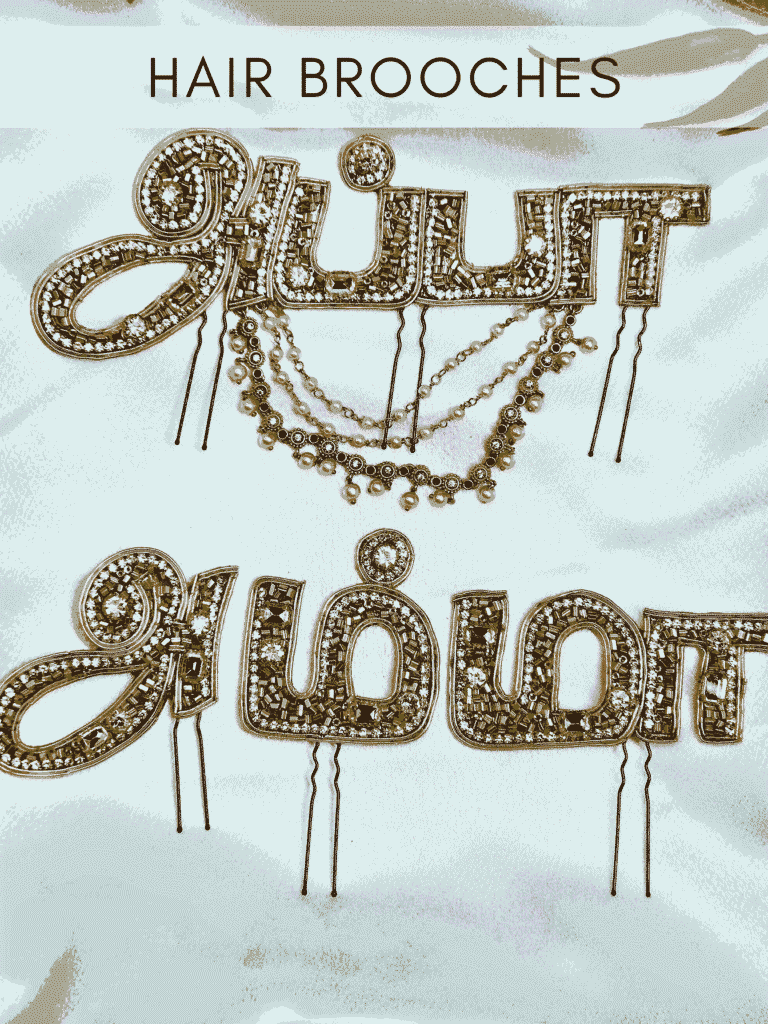 Elegant traditional hair brooch with gold and pearl detailing