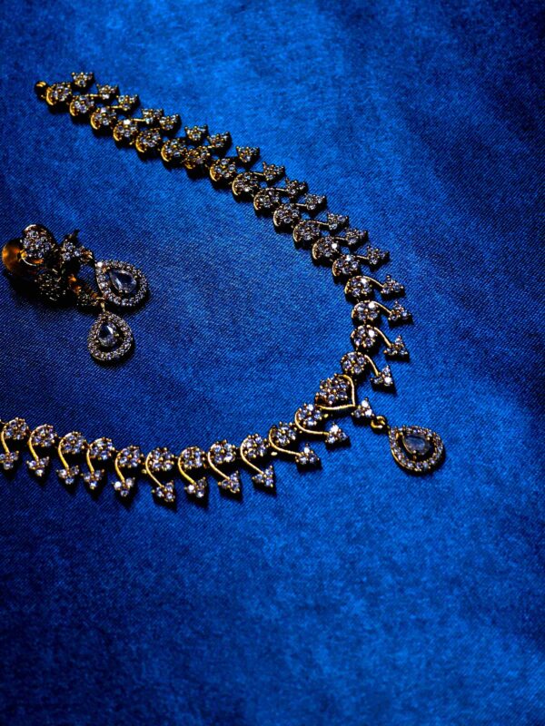 Half heart design jewellery set with elegant necklace and matching earrings