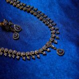 Half heart design jewellery set with elegant necklace and matching earrings