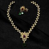 Hanging gem jewellery set with elegant pendant and matching earrings