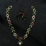 Oval-shaped designer jewellery set with necklace and matching earrings