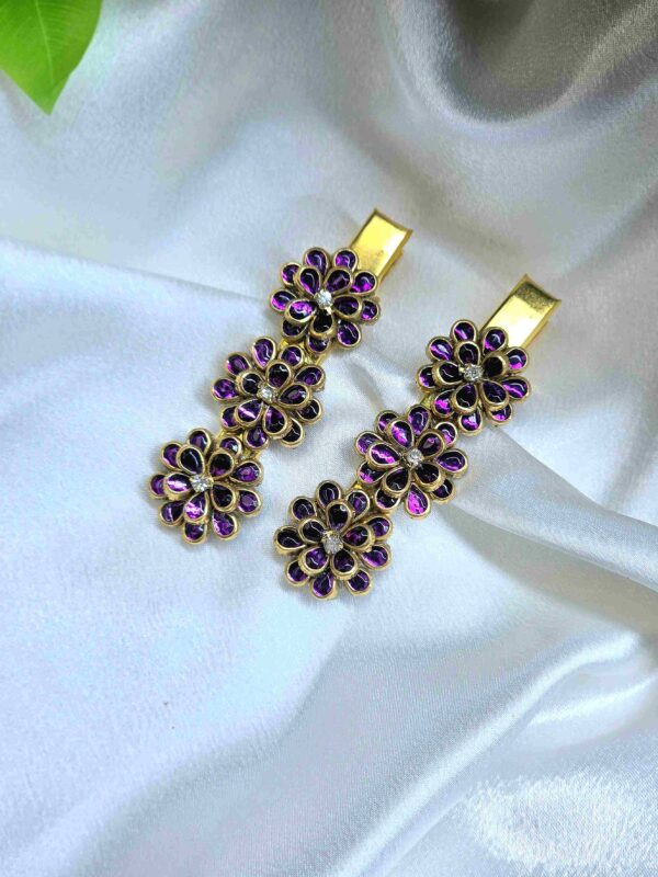 Purple hair clip with floral design