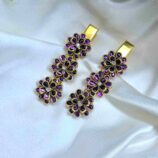 Purple hair clip with floral design