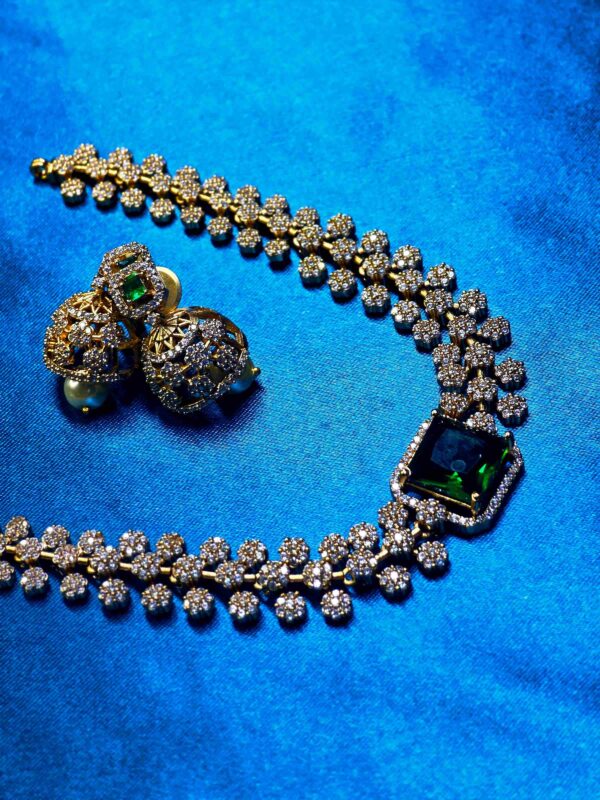 Rectangle-shaped green gemstone jewelry set with necklace and earrings