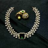 Rectangle-shaped green gemstone jewellery set with earrings and necklace
