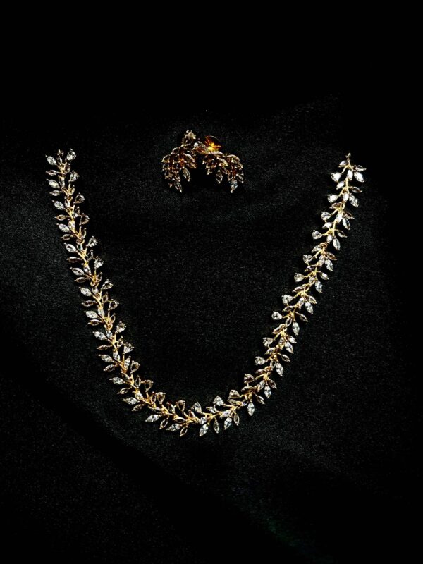 White leaf pattern jewellery set with necklace and earrings