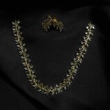 White leaf pattern jewellery set with earrings and necklace