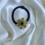 Yellow flower hair tie for stylish hair accessories
