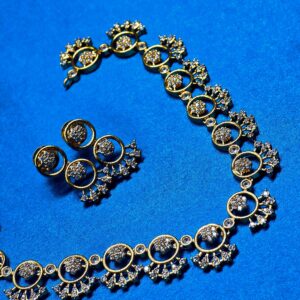 Circle pattern jewelry set with necklace and matching earrings