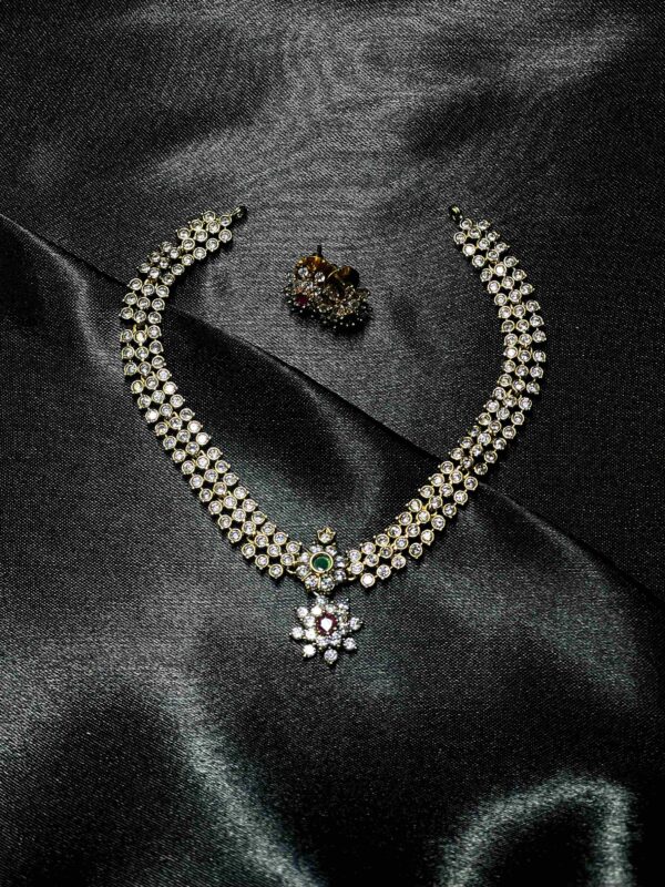 White stone jewellery set with necklace and matching earrings