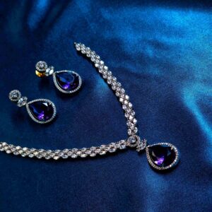 Purple gemstone jewelry set with necklace and matching earrings