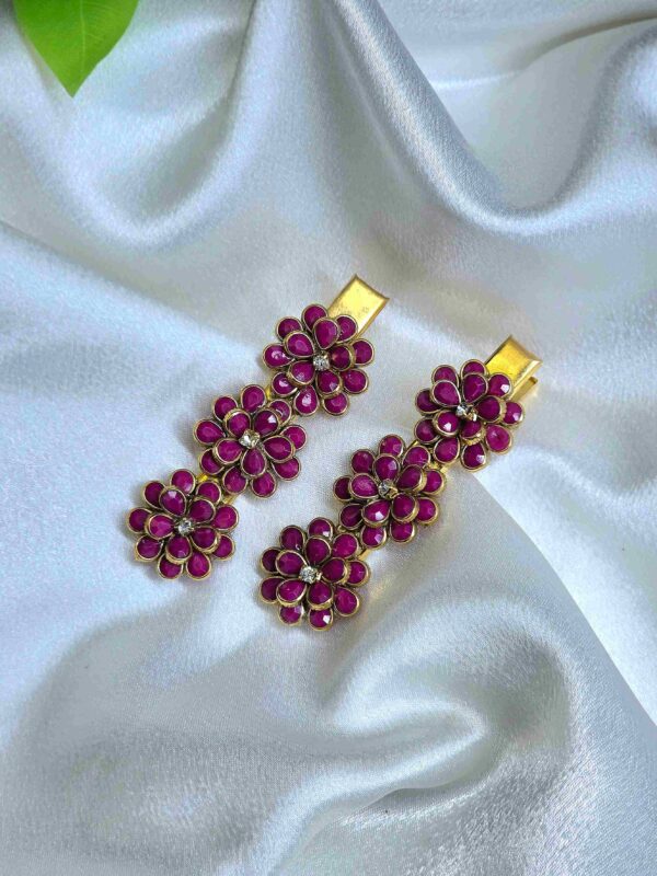 Red hair clip with sleek glossy finish