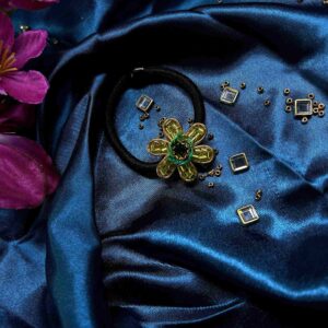 Greenish flower hair tie