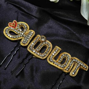 Amma brooches