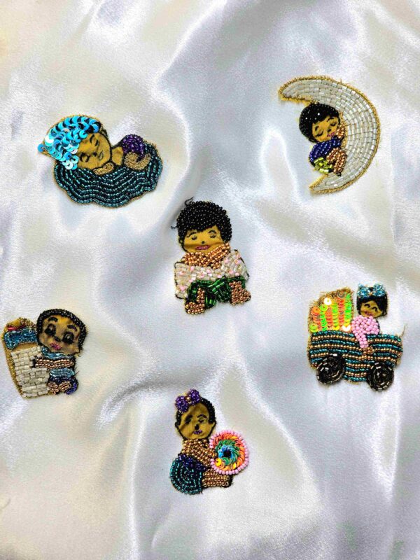 Baby-doll brooches Baby-doll brooches