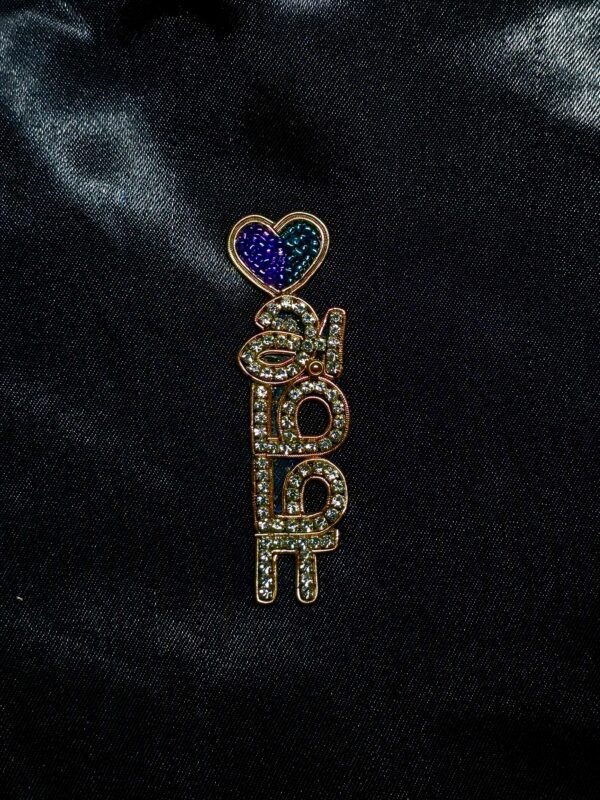 Amma with Hearth Brooches Amma with Hearth Brooches